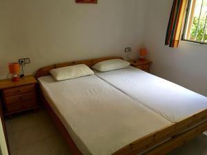 Krevet ili kreveti u jedinici u okviru objekta Villa Cala Blanca