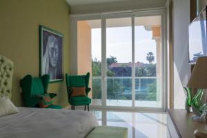 Postel nebo postele na pokoji v ubytování Hermosa mansión en Puerto Aventuras con alberca