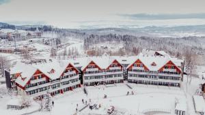 Apartament Malinowy Zakątek Triventi Mountain Residence v zime