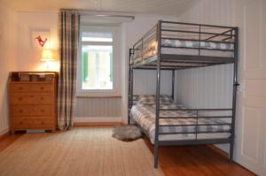 Letto o letti in una camera di Alpine Haus