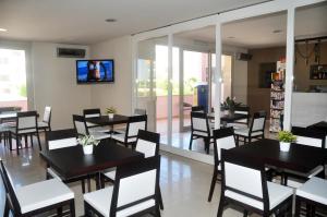TV a/nebo společenská místnost v ubytování Hotel La Punta