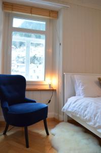 Letto o letti in una camera di Alpine Haus