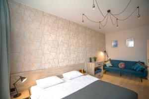 Posteľ alebo postele v izbe v ubytovaní 3 bedroom, 2 bathroom Apartment near Forum Lviv