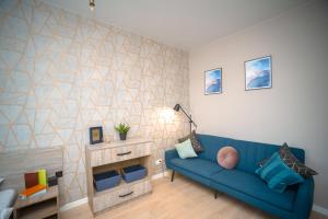 Posedenie v ubytovaní 3 bedroom, 2 bathroom Apartment near Forum Lviv