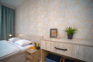 Posteľ alebo postele v izbe v ubytovaní 3 bedroom, 2 bathroom Apartment near Forum Lviv