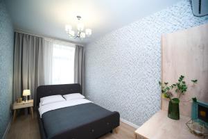 Posteľ alebo postele v izbe v ubytovaní 3 bedroom, 2 bathroom Apartment near Forum Lviv