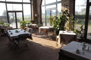 Reštaurácia alebo iné gastronomické zariadenie v ubytovaní Agriturismo-R&B Corte dei Gioghi