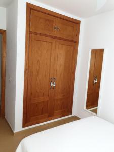 Posteľ alebo postele v izbe v ubytovaní Apartamento Conil, perfecta ubicación