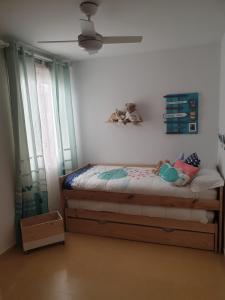 Posteľ alebo postele v izbe v ubytovaní Apartamento Conil, perfecta ubicación