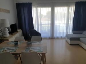 Posedenie v ubytovaní Apartamento Conil, perfecta ubicación