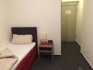 Cama o camas de una habitación en Central Hotel