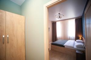 Posteľ alebo postele v izbe v ubytovaní 3 bedroom, 2 bathroom Apartment near Forum Lviv
