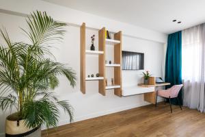 TV a/nebo společenská místnost v ubytování Septa Studios by Skg Apartments