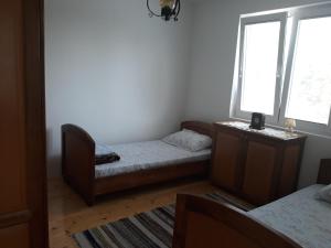 Postel nebo postele na pokoji v ubytování Seosko turisticko domaćinstvo Jagor