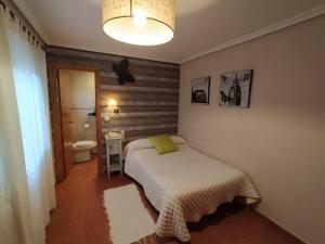 Postel nebo postele na pokoji v ubytování Hotel Iris La Eliana