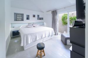 Ένα ή περισσότερα κρεβάτια σε δωμάτιο στο Villa Palmera +75 φωτογραφίες