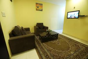 Un lugar para sentarse en Al Eairy Apartments - Al-Damam 2