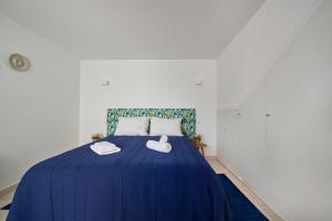 Ένα ή περισσότερα κρεβάτια σε δωμάτιο στο Beautiful Seaside Apartments +71 φωτογραφίες