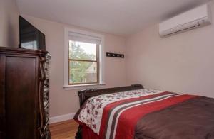 a bedroom with a bed and a window at Cold Spring Hotel in Cold Spring +26 photos