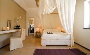 Postelja oz. postelje v sobi nastanitve Hotel Borgo Pantano