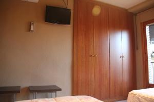 Postel nebo postele na pokoji v ubytování Hostal Cafeteteria Goya