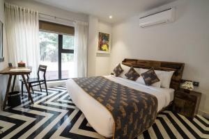 Brij Nest, Jaipur - An All Suite Boutique Hotel客房内的一张或多张床位