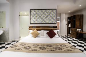 Brij Nest, Jaipur - An All Suite Boutique Hotel客房内的一张或多张床位