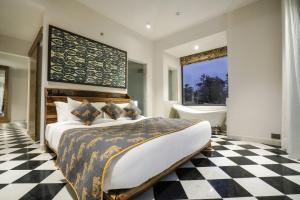 Brij Nest, Jaipur - An All Suite Boutique Hotel客房内的一张或多张床位