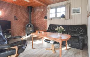 Posezení v ubytování Three-Bedroom Holiday Home In Hemmet