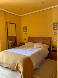 A bed or beds in a room at El Pino de Cerler