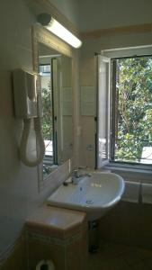 Ванная комната в Sabini Rentals - Affittacamere