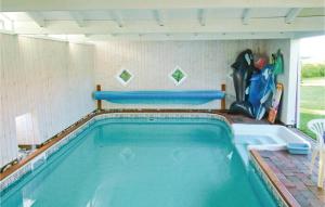 a swimming pool in a house with at Rosenhavet in Vejby