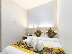 Photo de la galerie de l'établissement Top Garden Hotel, à Hutan Melintang 75 autres photos