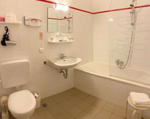 Koupelna v ubytování Altstadthotel Augsburg
