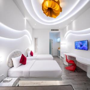 Ένα ή περισσότερα κρεβάτια σε δωμάτιο στο Avatara Resort