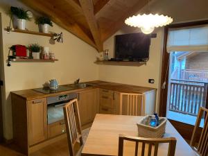 Kuchyň nebo kuchyňský kout v ubytování Chalet Nocciolini