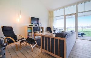 TV a/nebo společenská místnost v ubytování Apartment Nordre Strandvej Ii