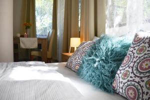 Posteľ alebo postele v izbe v ubytovaní Gyula Wellness Villa