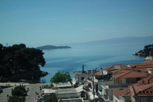a view of a city and the water at Pension Ververi in Skiathos