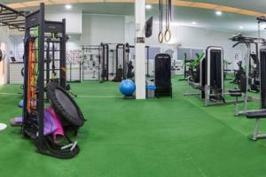 Posilňovňa alebo fitness centrum v ubytovaní KAMA Alojamiento Turístico con piscina privada