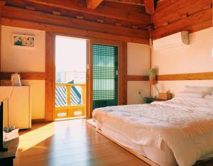Кровать или кровати в номере Siwoowadang