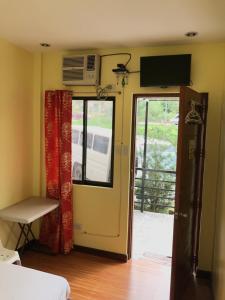 Afbeelding uit fotogalerij van Jhunlyn Room Rental in Tagaytay