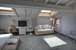 TV a/nebo společenská místnost v ubytování Albergo Accademia