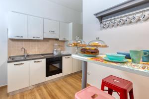 Kuchyň nebo kuchyňský kout v ubytování Relais Mantellini