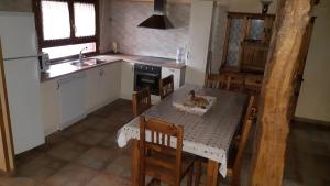 A kitchen or kitchenette at EL CAMPANARIO