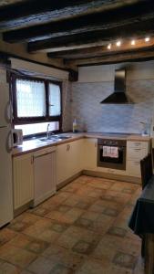 A kitchen or kitchenette at EL CAMPANARIO