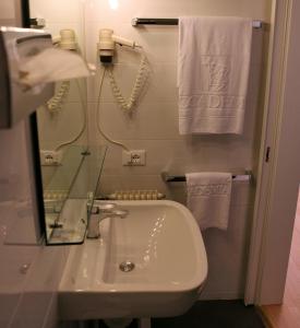 Koupelna v ubytování Albergo Accademia