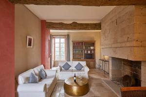 Et opholdsområde på Gîte Le Logis - Manoir le Plessix Madeuc + 1 billede