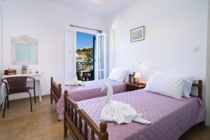 Postel nebo postele na pokoji v ubytování Villa Galini
