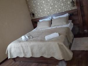 Letto o letti in una camera di Cozy House Kazbegi